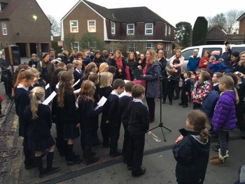 School choir singing at Christmas lights Event